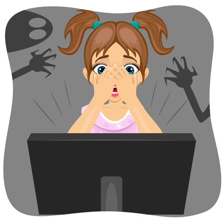 boy covering his face while watching horror movie on internet.  Shadow of ghost on the wallのイラスト素材