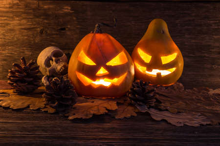 Halloween pumpkins head jack lantern with scary evil faces spooky holidayの写真素材