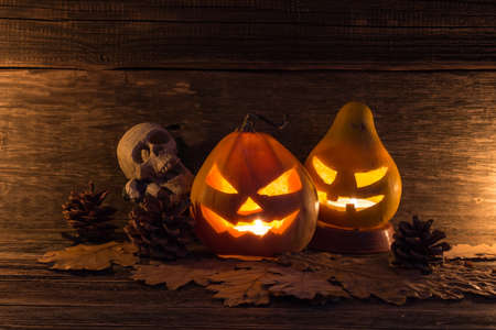 Halloween lantern head pumpkins scary spooky and creepy faces in the dark nightの写真素材