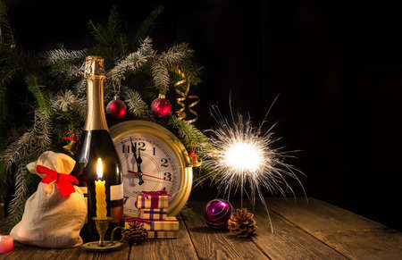 Sparks of Bengal fire and champagne bubbles. Happy New Year!の写真素材