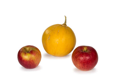 Ripe apples and pumpkin isolated on white background.  Close-up. Autumn theme.の写真素材