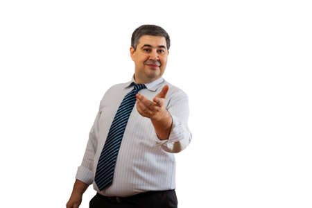 A man businessman invites for cooperation. Invitation to action. Focus on the hand. Isolated on white.の写真素材