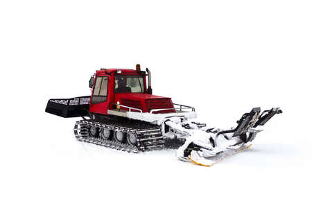 A machine for preparing a ski slope. Ratrak "snow cat" is laying a ski track. Isolated on white background.の写真素材