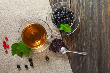 Healthy breakfast. Tea with currant jam. View from above.の写真素材