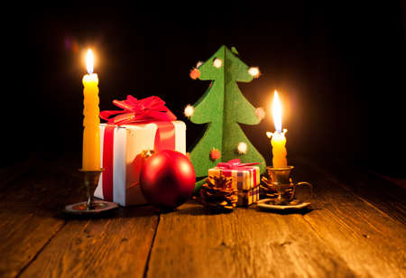 Celebrating Christmas. Bright lights on Christmas Eve. Christmas decorations and candles.の写真素材