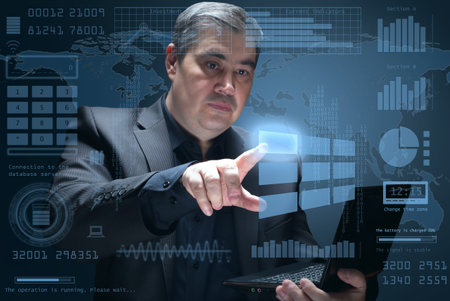 Holographic projection of the virtual interface. Futuristic HUD interface. The businessman clicks on...