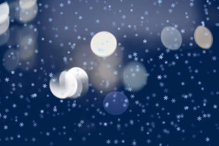 Winter Christmas background with snowflakes and bokeh - New Year's fairy taleの写真素材