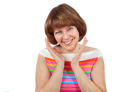Cute girl in a bright T-shirt smiling and looking at the cameraの写真素材