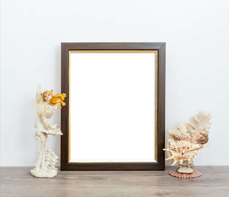 Minimalistic mocap 8x10 with a statuette of a nymph and corals. Portrait orientation.の写真素材