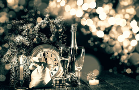 Bottle of Champagne, Glasses and Bubbles. Christmas Eve.