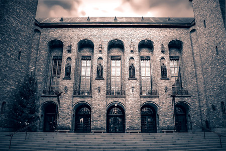 Sweden, Stockholm - Town Hall - Municipal Council Building - View from the Courtyard - Ancient Sculptures of Knights on the Building Wallsの写真素材