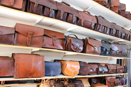 Leather shop - bags, briefcases, wallets and belts made of genuine leather. Handicraft production of...