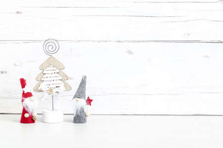 Light wood background with holiday symbols. Add your design.の写真素材