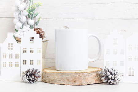 Mockup of a white ceramic mug with winter symbols. winter mockup.の写真素材