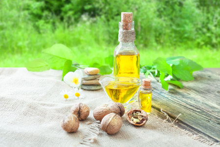 Walnut oil - essential oil in a glass jar - oil for cosmetics and pharmaceuticalsの写真素材
