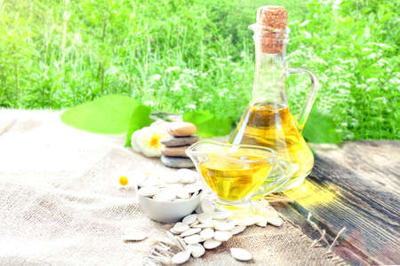 Pumpkin seed oil - a health product - a source of vitamins and nutrientsの写真素材