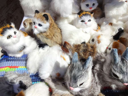 Traditional Russian crafts - fur toys - bunnies, kittensの写真素材