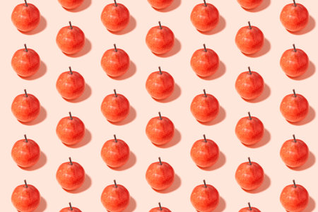 Bright summer background with apples on a pink backgroundの写真素材