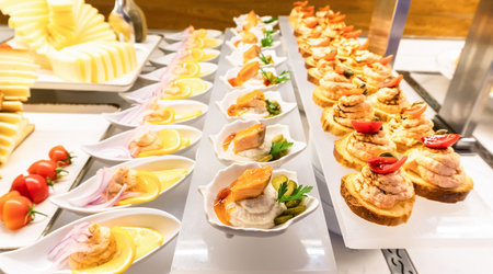 Cold appetizers of bread with fish pate and vegetables. Table with appetizers. Beautiful table...