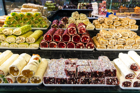 Traditional Turkish delight (rahat lokum) with nuts, dried fruits, and fruit syrup. National Turkish delicacies.の写真素材
