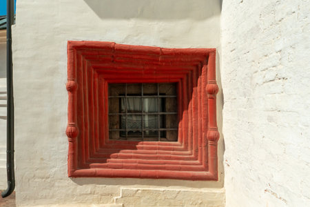 A small ancient window in the thick wall of the Kirillo-Belozersky Monasteryの写真素材