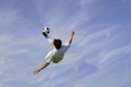 Football - Soccer Player performing Bicycle Kickの写真素材
