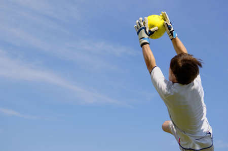 Soccer Football Goalie making diving saveの写真素材