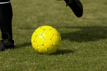 Yellow Soccer - Football getting kicked