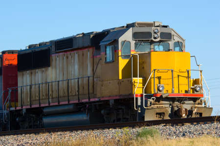 Train engine in yard on sunny dayの写真素材