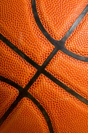 Leather basketball on wooden gym floorの写真素材