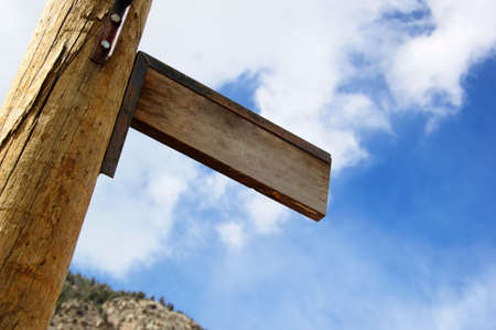 Blank vintage wooden street sign in old mining village in Coloradoの写真素材