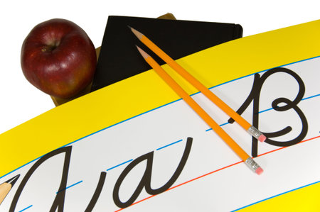 Back to school items, pencils, books, alphabet sign