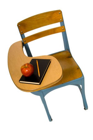High view of school desk with book, apple and pencilの写真素材
