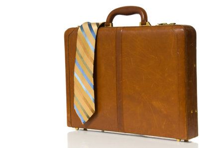 Man's dress necktie on top of business briefcase, attacheの写真素材