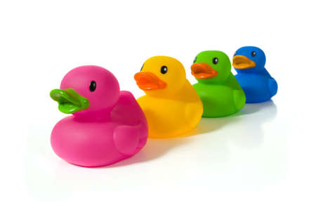 Several different colors of rubber ducks.  Could be a symbol of diversity or cooperationの写真素材