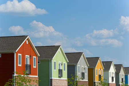 Brightly colored new homes with classic stylingの写真素材