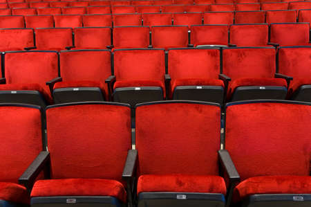 Red velvet concert hall seating backgroundの写真素材