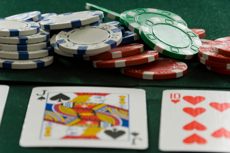 Poker Chips and Cards on table