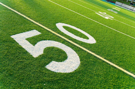Closeup of 50 yard line on American football fieldの写真素材