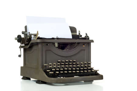 Vintage Typewriter on white background with space for copy on the paper,の写真素材