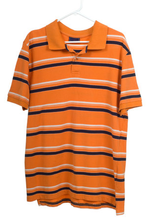 Orange stripped young man's or college student's shirt on hanger on white backgroundの写真素材