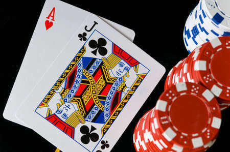 Gambling game with a game of Poker and several denomintions of chipsのeditorial素材