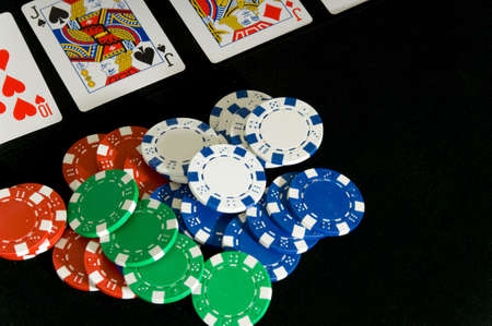 Gambling game with a game of Poker and several denomintions of chipsのeditorial素材