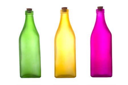 Colorful bottles on a white background with copy spaceの写真素材