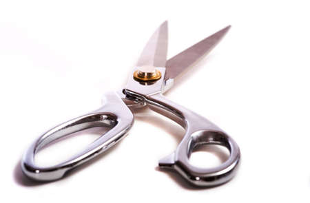a pair of chrome dress shears or ceremonial scissors on a white backgroundの写真素材
