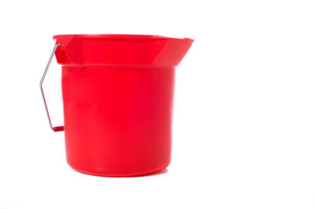 A red bucket or pale on a white backgroundの写真素材