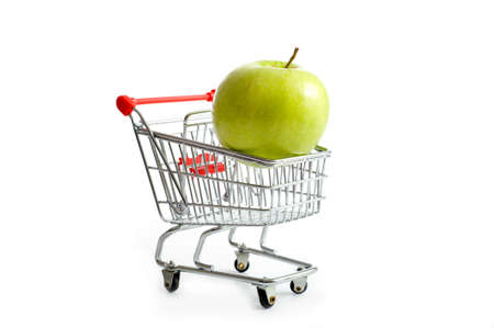 Shopping cart with appleの写真素材