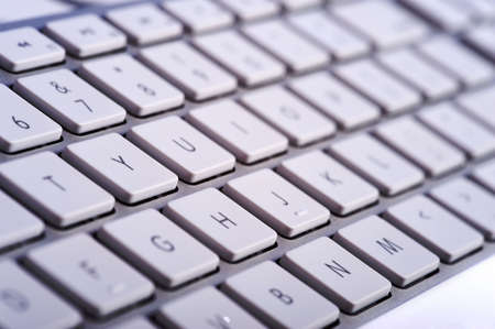 A modern computer keyboard on a white backgroundの写真素材