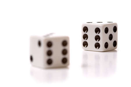 a set of White dice on a white backgourndの写真素材