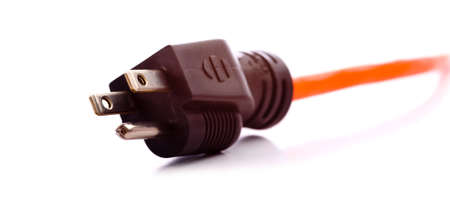 A close-up of a an end of the male end of and extension cord on a white backgroundの写真素材
